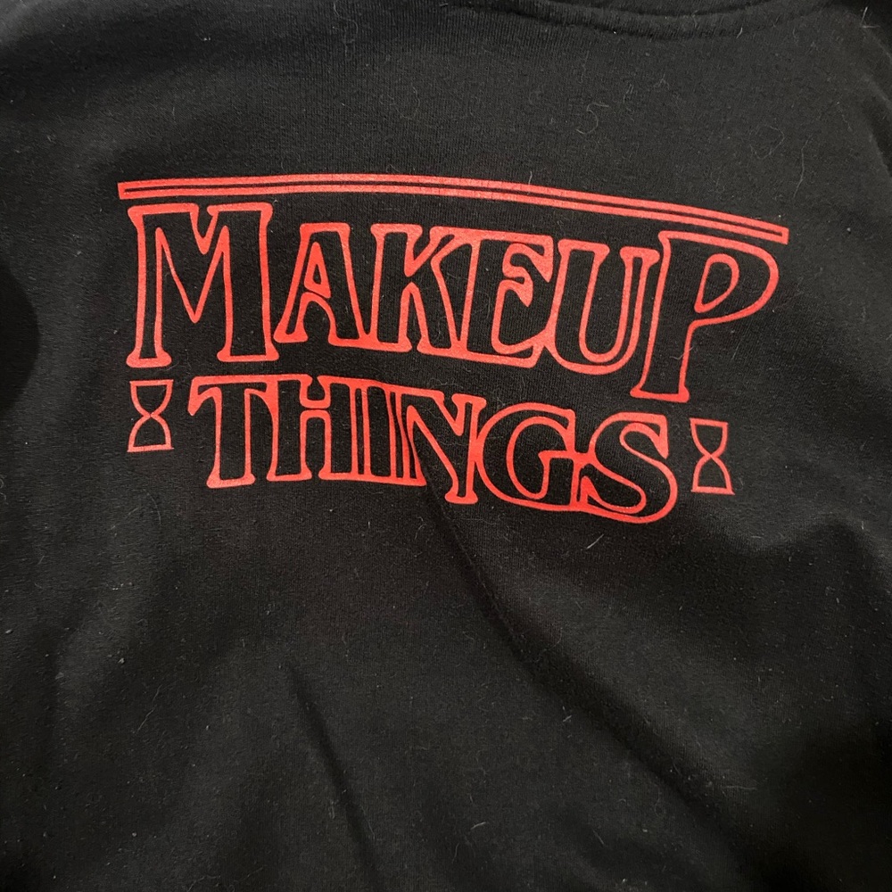 Sweatshirt- makeup things- time Los Angeles